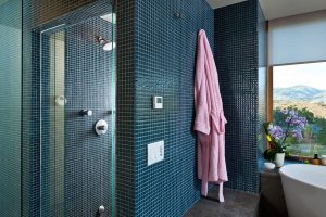 bathroom with blue tiled walls