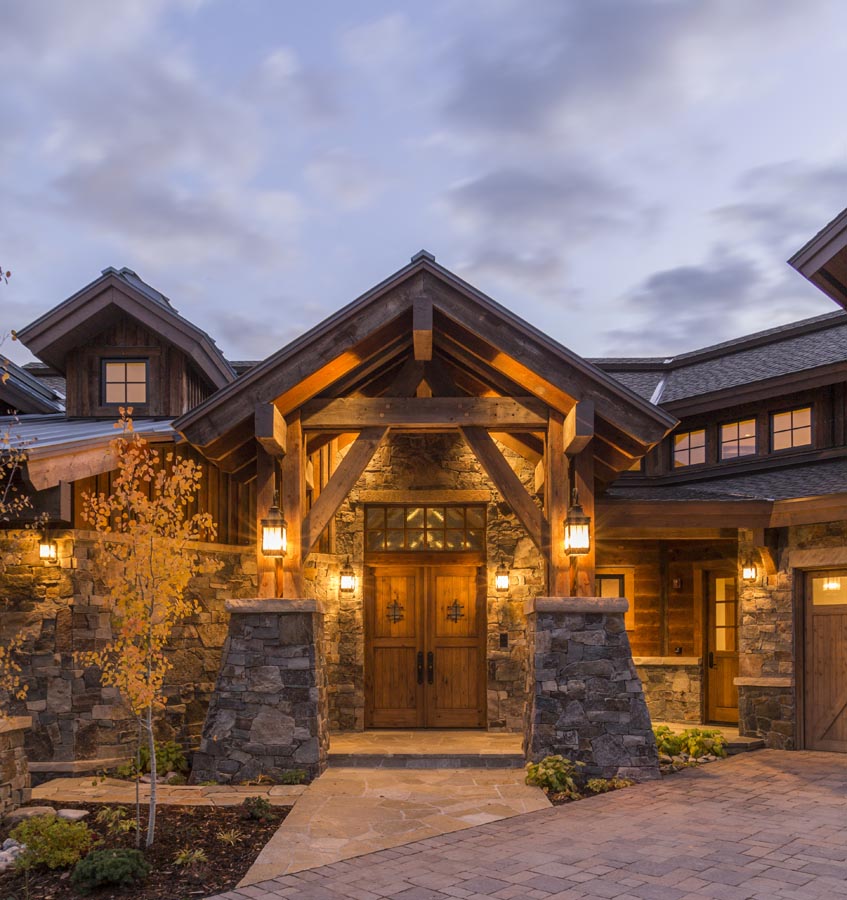 home exterior with dramatic trusses